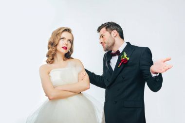 portrait of young wedding couple having argument  clipart