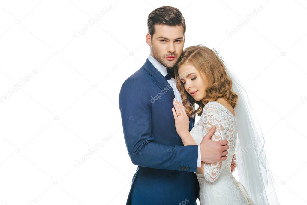 portrait of sensual bride and groom isolated on white