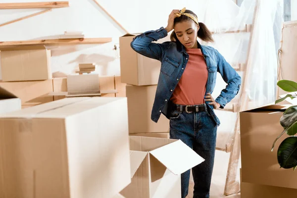 Upset Tired African American Girl Unpacking Cardboard Boxes New Home — Stock Photo, Image