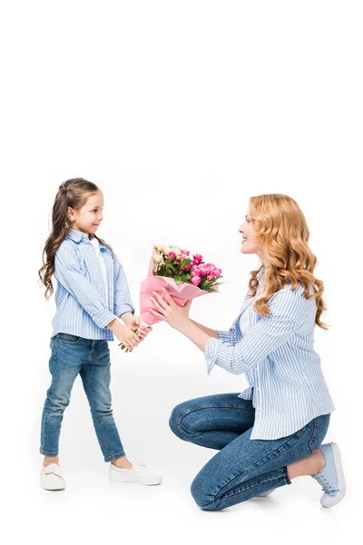 Daughter Presenting Bouquet Flowers Cheerful Mother Isolated White Mothers Day — Stock Photo, Image