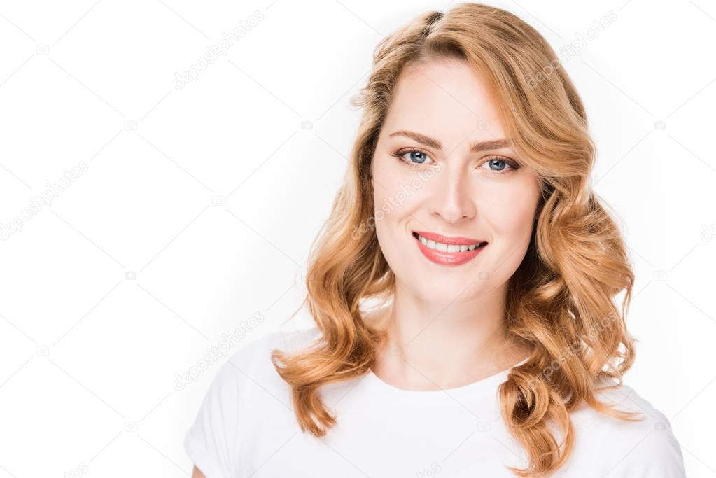 portrait of smiling caucasian woman isolated on white