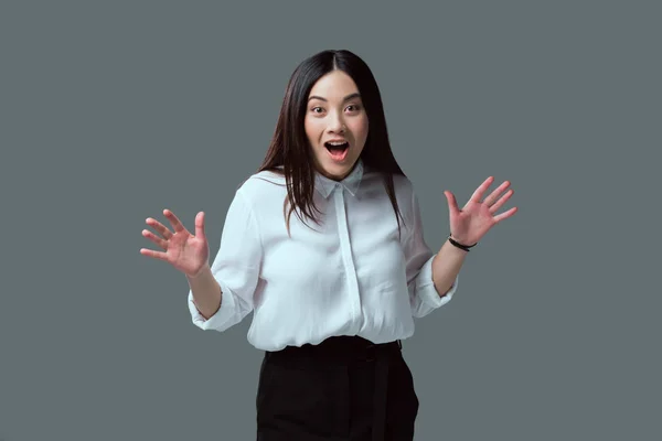 Shocked Young Woman Gesturing Hands Looking Camera Isolated Grey — Stock Photo, Image