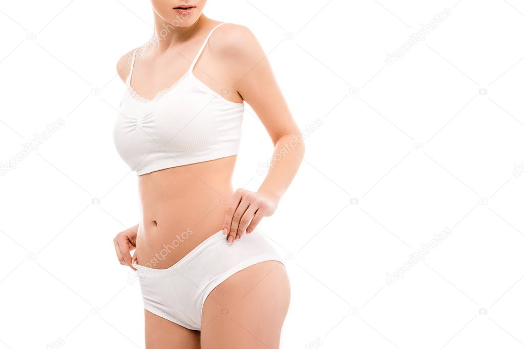 cropped view of girl in white lingerie, isolated on white