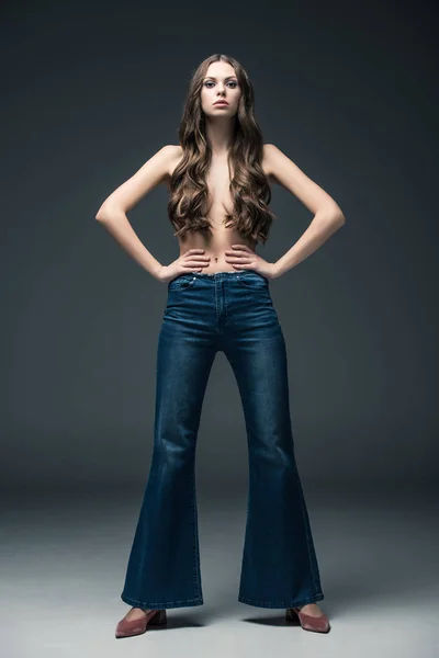Beautiful Half Naked Girl Long Hair Posing Flare Jeans Grey — Stock Photo, Image