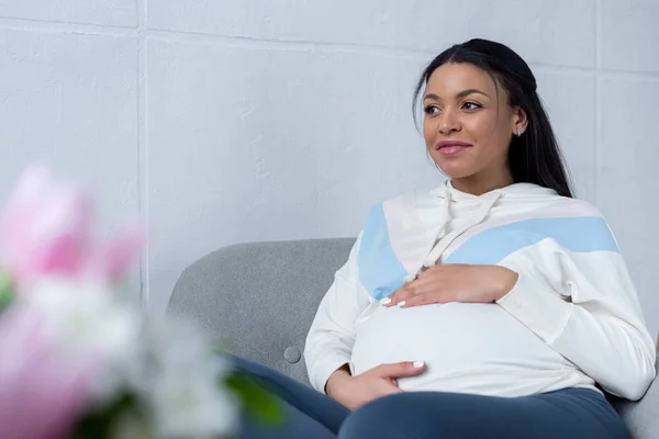 African American Pregnant Woman Sitting Armchair Home — Stock Photo, Image
