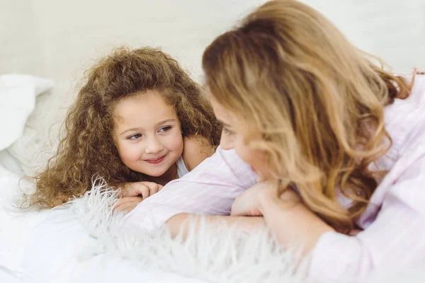 Happy Mother Curly Daughter Lying Sheep Skin Blanket Looking Each — Stock Photo, Image