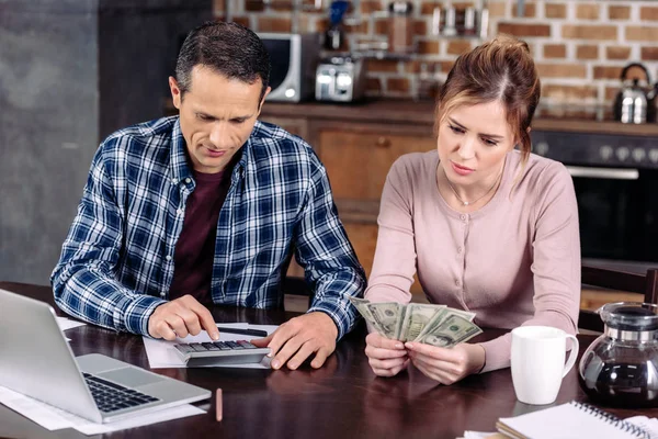Couple counting money Stock Photos, Royalty Free Couple counting money ...
