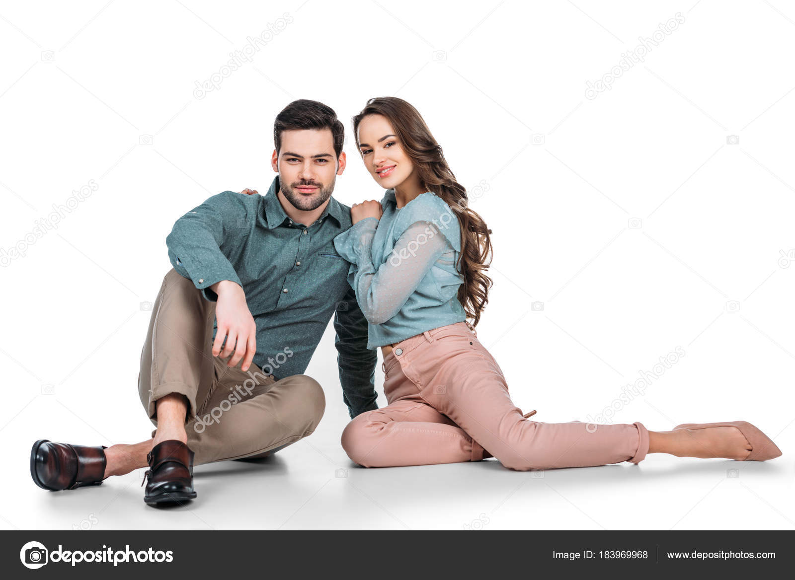 Romantic couple sitting on picnic table in park Stock Photo - Alamy