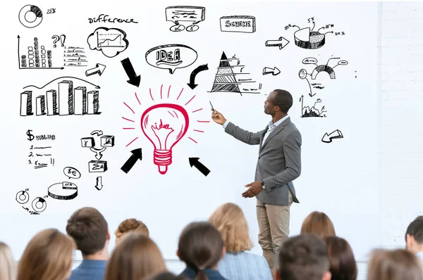 African American Man Showing Business Icons Meeting Office Space — Stock Photo, Image