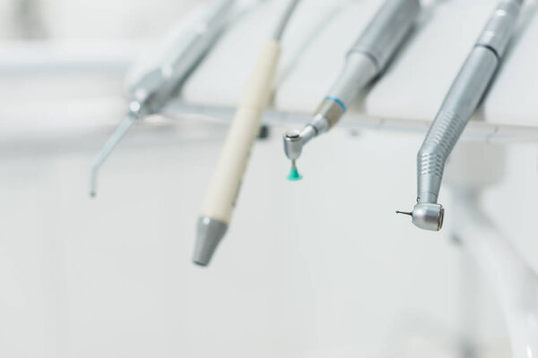 Close-up view of row of dentistry tools in modern clinic