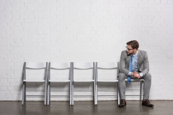 Caucasian Businessman Looking Empty Chairs While Waiting Job Interview — Stock Photo, Image