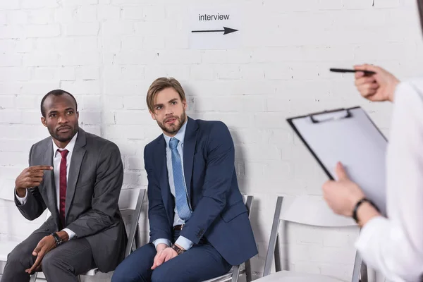 Cropped Shot Woman Pointing Multiethnic Businessmen Job Interview — Stock Photo, Image