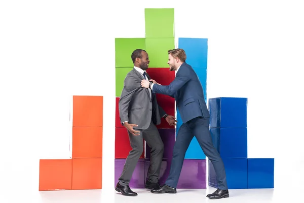 Side View Angry Multicultural Businessmen Having Argument Colorful Blocks Isolated — Stock Photo, Image