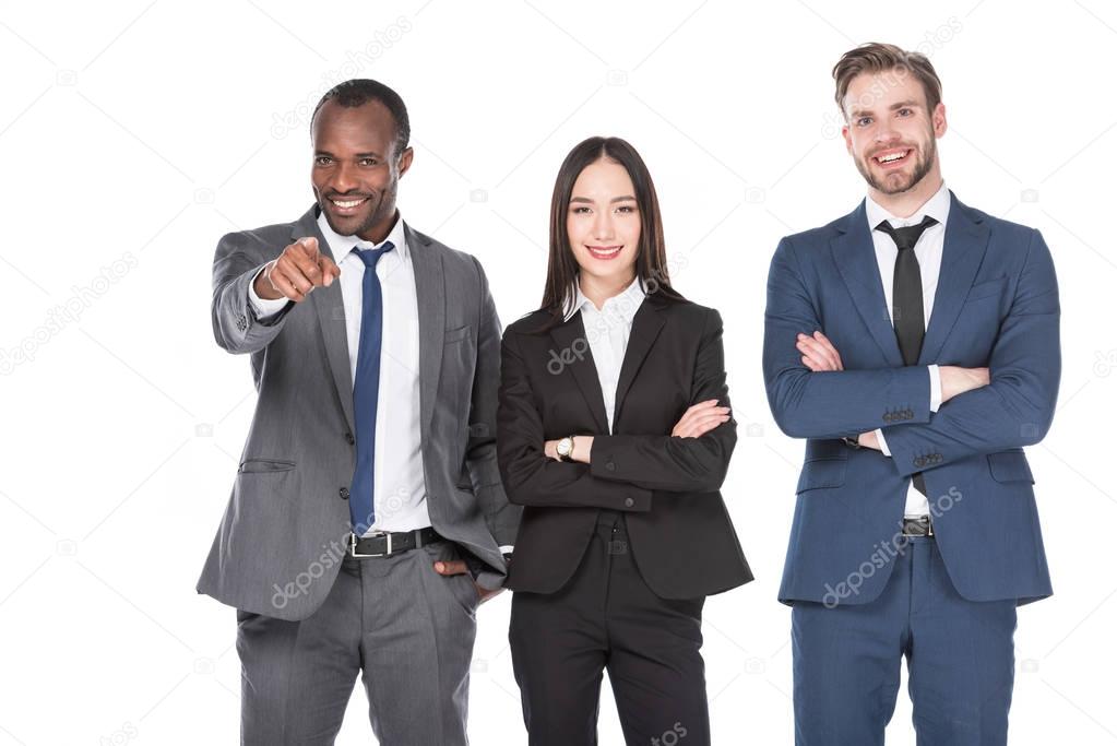 portrait of smiling multicultural young business people isolated on white