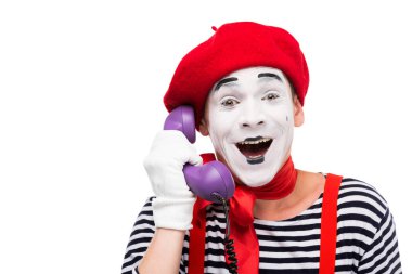 mutlu MIME ultra violet retro sabit telefon üzerinde beyaz izole konuşmak