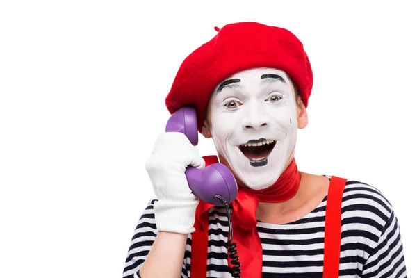 Szczęśliwy Mime Rozmawia Przez Ultra Violet Retro Telefonu Stacjonarnego Białym — Zdjęcie stockowe