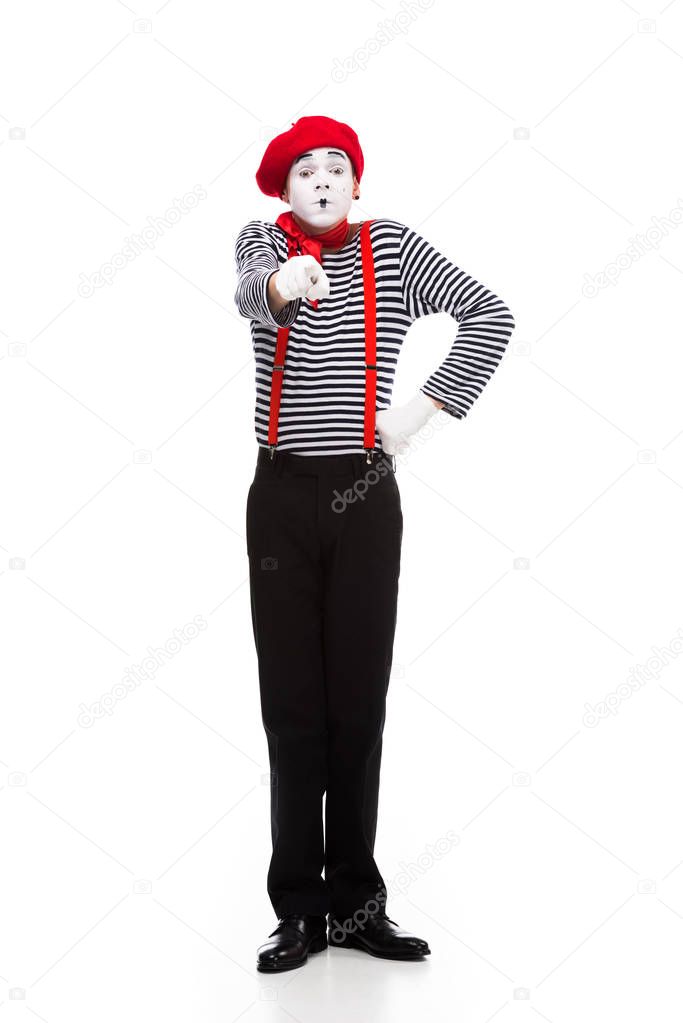 grimacing mime pointing on camera isolated on white