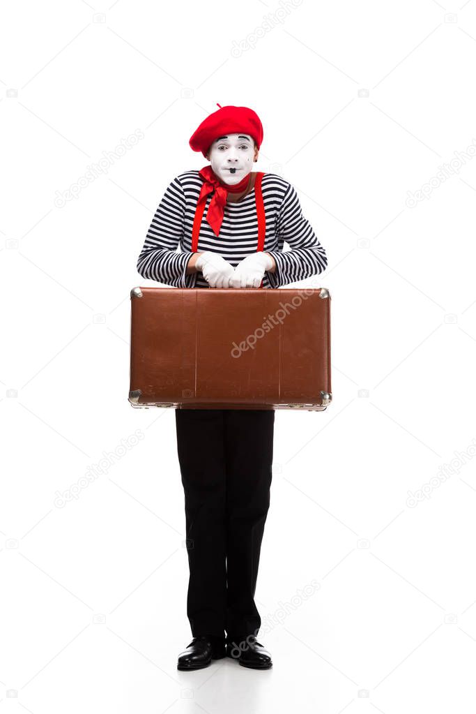 mime holding brown suitcase isolated on white