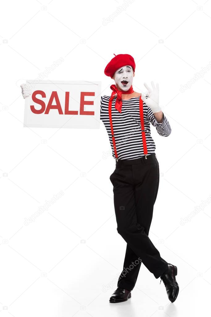 mime holding sale signboard and showing ok sign isolated on white