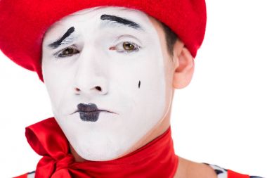 portrait of grimacing mime with makeup isolated on white clipart