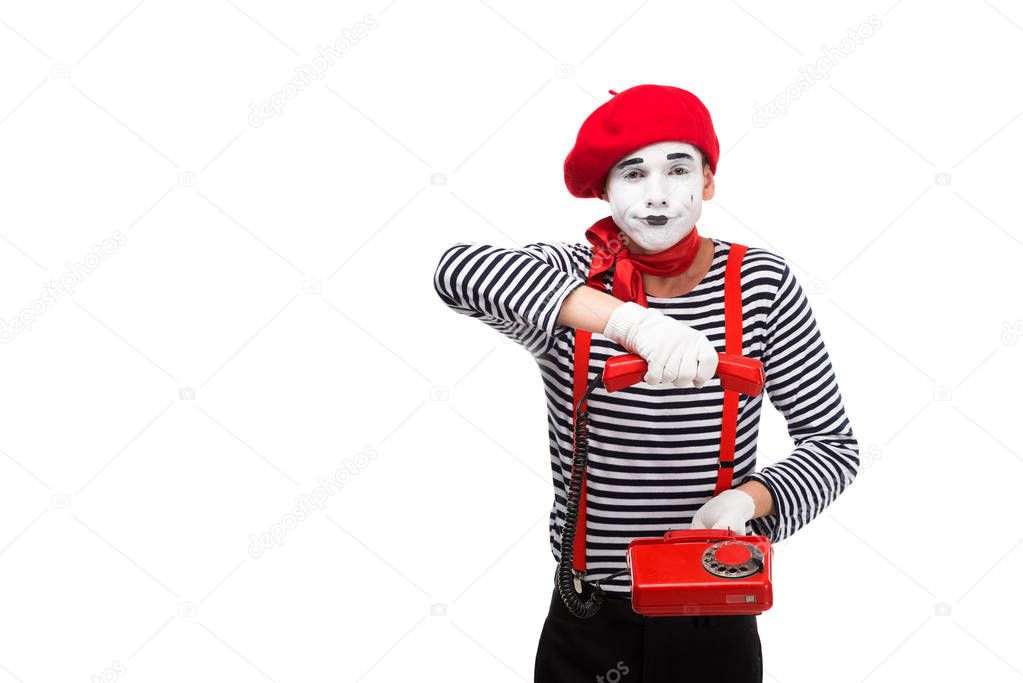 mime holding stationary telephone isolated on white