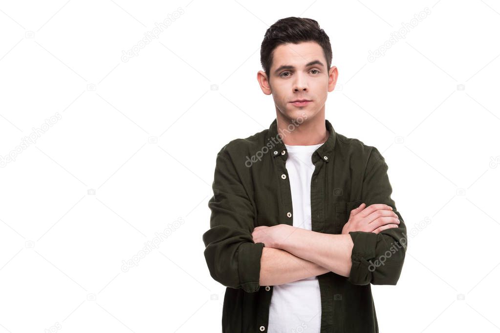 man standing with crossed arms isolated on white