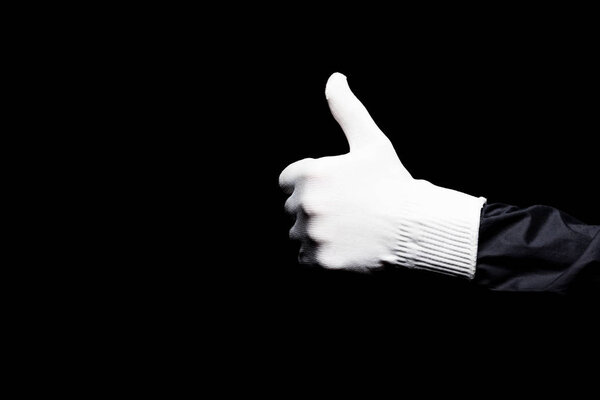 cropped image of mime showing thumb up isolated on black