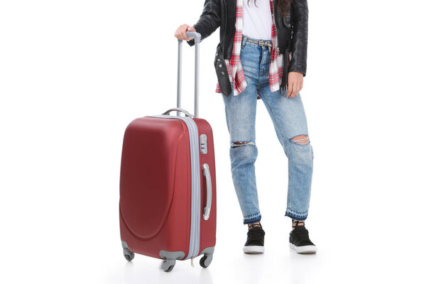cropped shot of stylish woman with luggage isolated on white