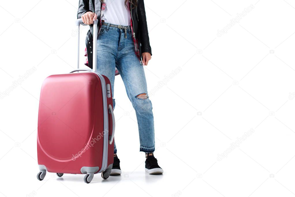 beautiful young woman with suitcase isolated on white