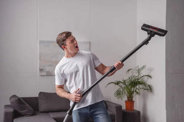 Handsome Man Having Fun Vacuum Cleaner Living Room — Stock Photo, Image