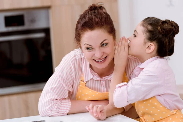 Grandmother Gossiping Little Granddaughter While Cooking — Stock Photo, Image