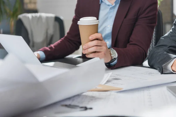Cropped Shot Architect Paper Cup Coffee Working Building Plans — Free Stock Photo