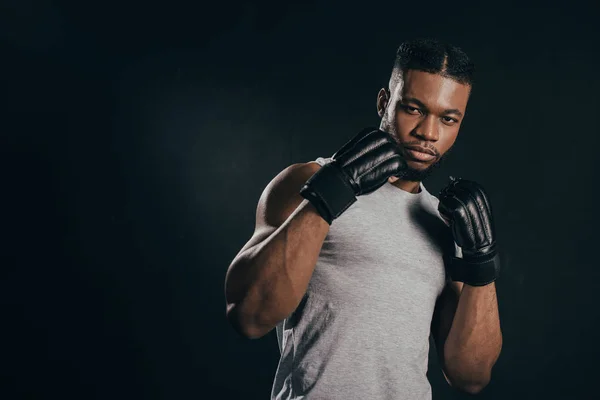Young African American Kickboxer Gloves Looking Camera Isolated Black — Free Stock Photo