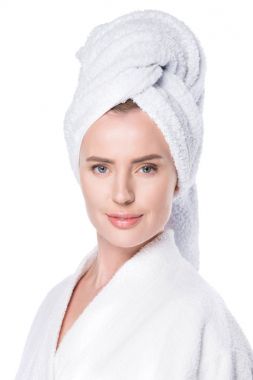 Portrait of smiling woman with clean skin in bathrobe and towel on hair isolated on white clipart
