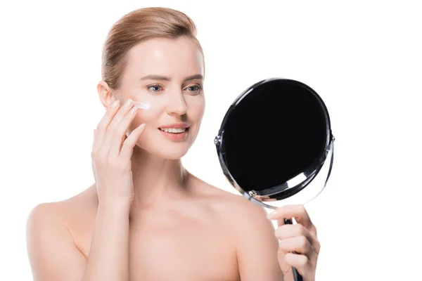 Woman Applying Cream Face While Looking Mirror Isolated White — Stock Photo, Image