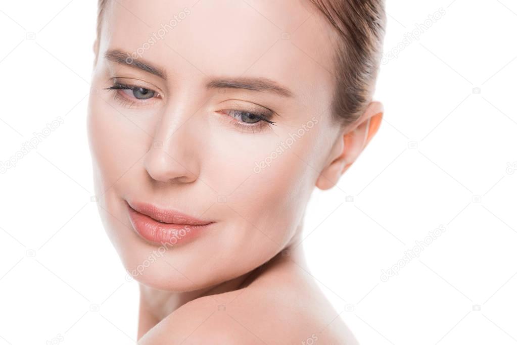 Woman with clean fresh skin isolated on white