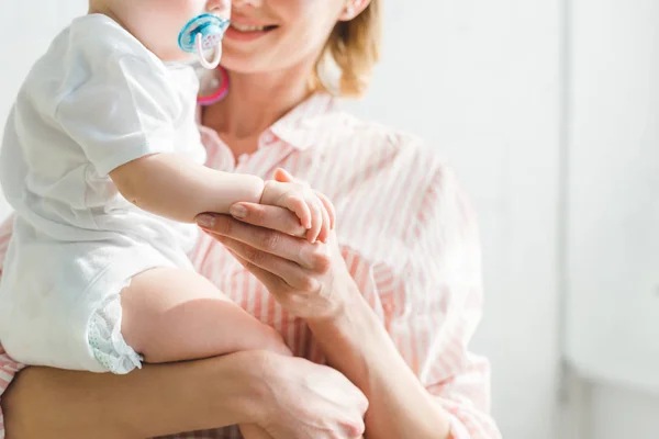 Cropped Image Mother Holding Infant Daughter Baby Dummy — Stock Photo, Image