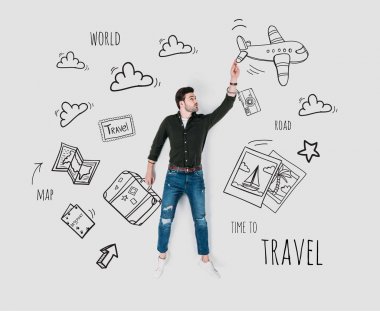 creative hand drawn collage with man and various travel signs clipart