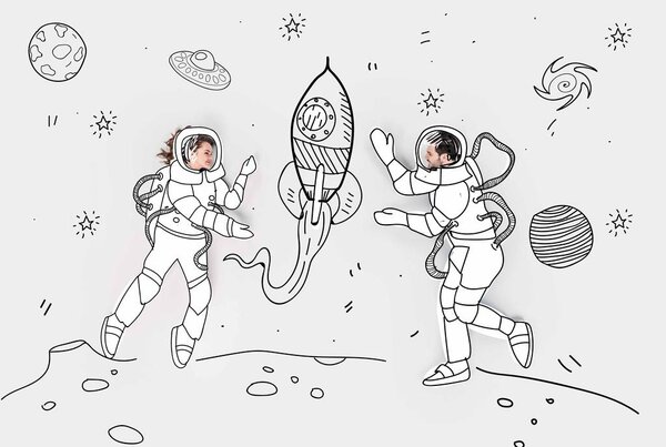 creative hand drawn collage with couple in space suits and rocket