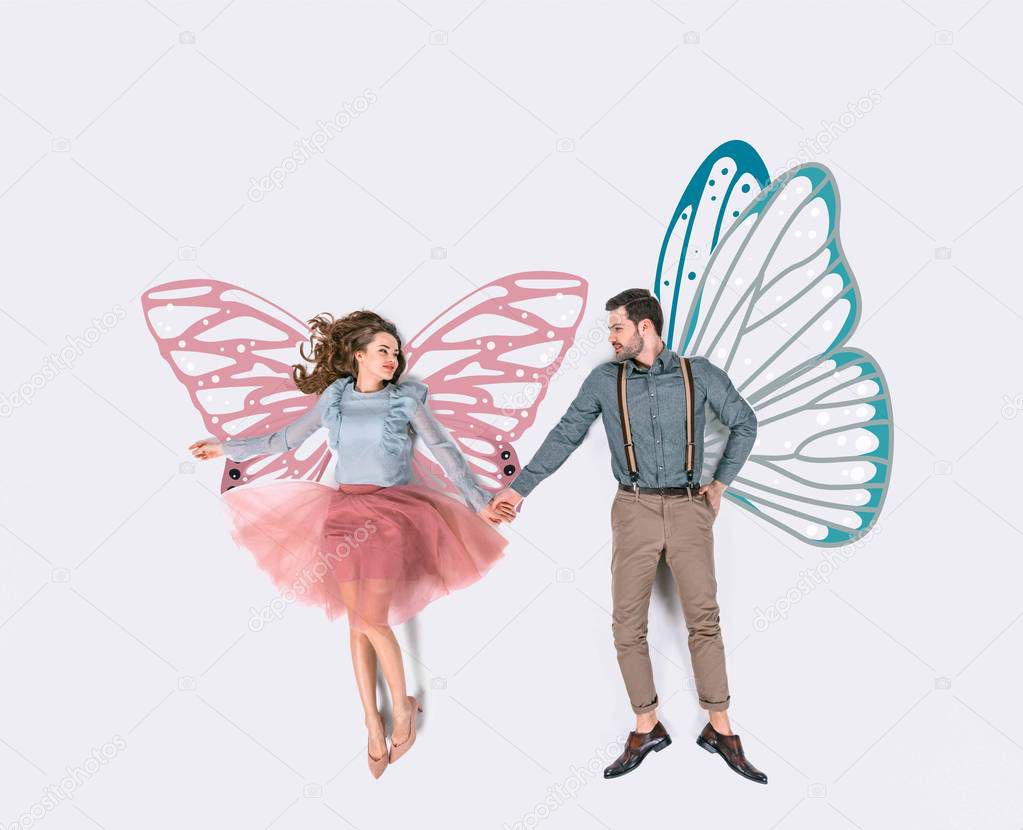 creative hand drawn collage with couple with fairy wings