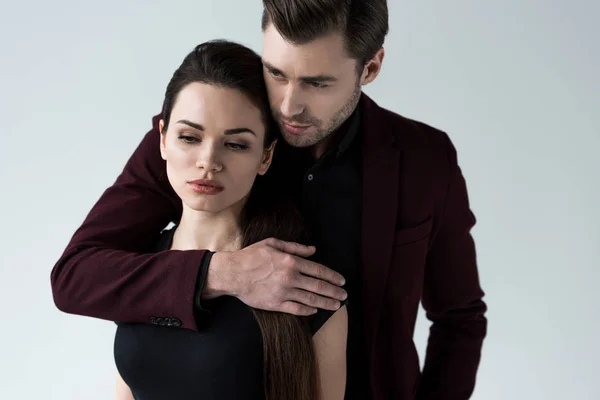 Handsome Man Hugging His Attractive Girlfriend Isolated Grey — Stock Photo, Image