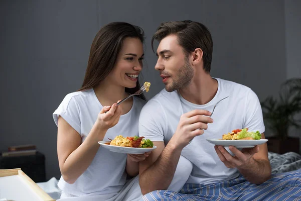 Smiling Man Woman Eating Eggs Breakfast Bed — Stock Photo, Image