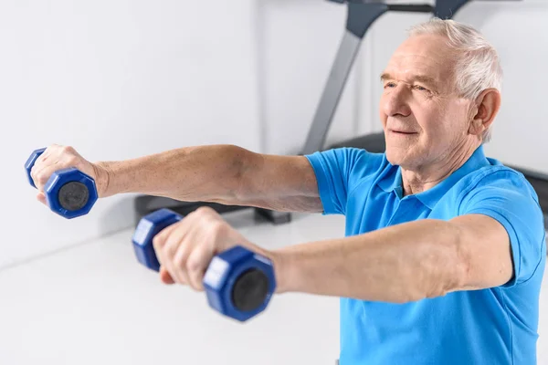 Selective Focus Smiling Senior Man Exercising Dumbbells — Stock Photo, Image