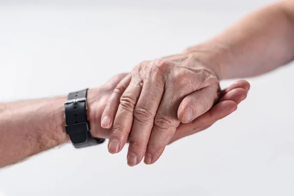 Обрезанный Снимок Пожилого Человека Реабилитационного Терапевта Держащихся Руки Изолированные Сером — стоковое фото