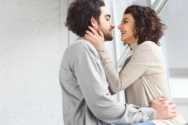 Happy Young Couple Cuddling Looking Each Other Home — Stock Photo, Image