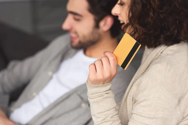 Girlfriend Holding Credit Card Looking Away Home — Stock Photo, Image