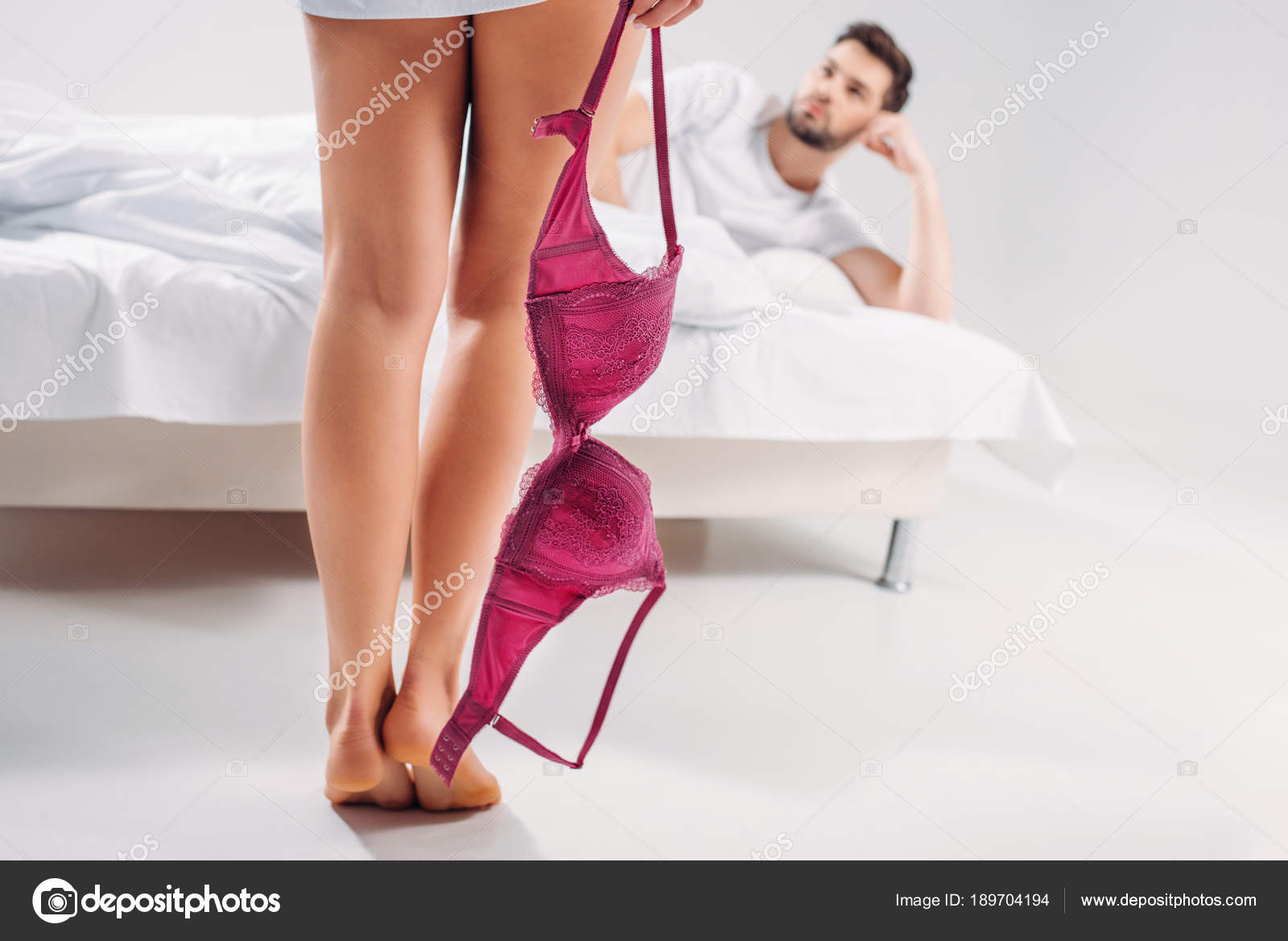 Selective Focus Woman Bra Hand Boyfriend Lying Bed Stock Photo by