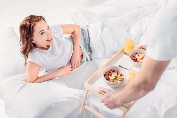 Partial View Man Brought Breakfast Bed Smiling Girlfriend — Stock Photo, Image