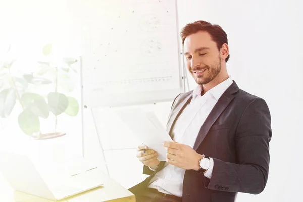 Smiling Handsome Businessman Reading Documents Office — Stock Photo, Image