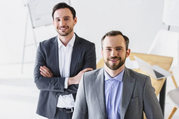 Smiling Handsome Businessmen Looking Camera Office — Stock Photo, Image